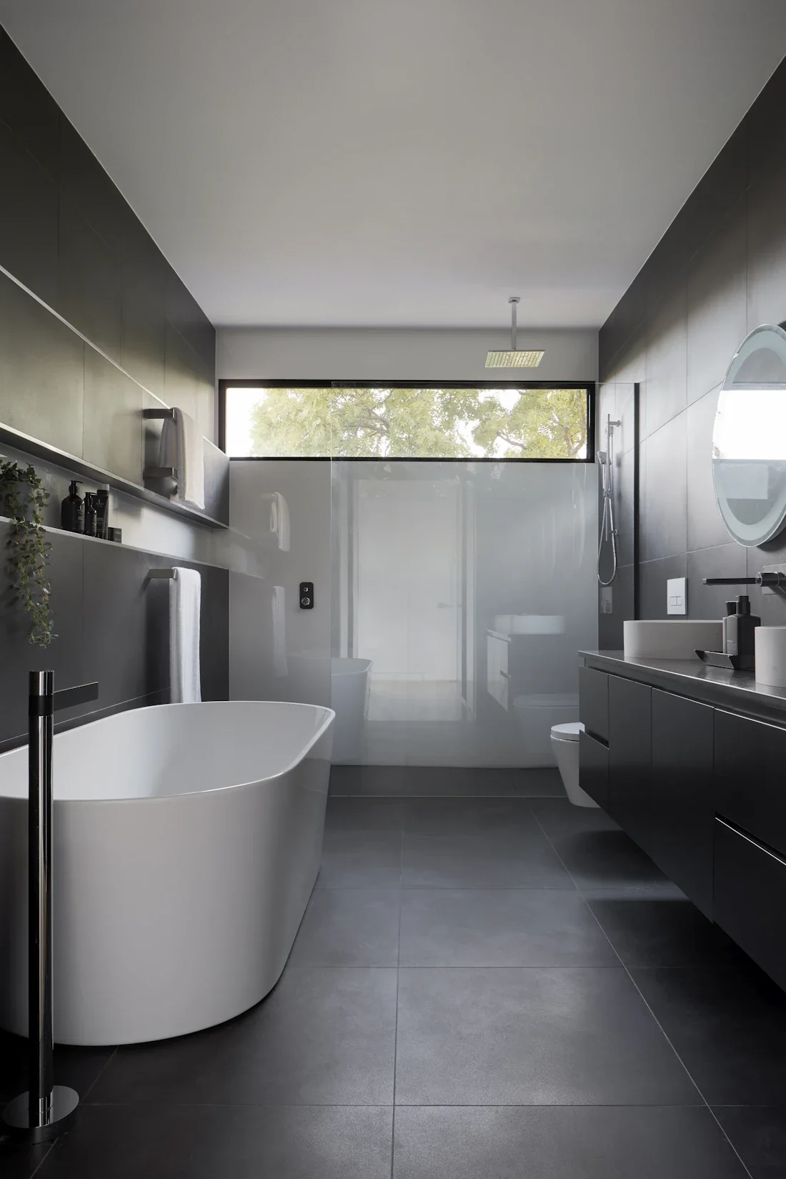 Bathroom with a freestanding bath and basin