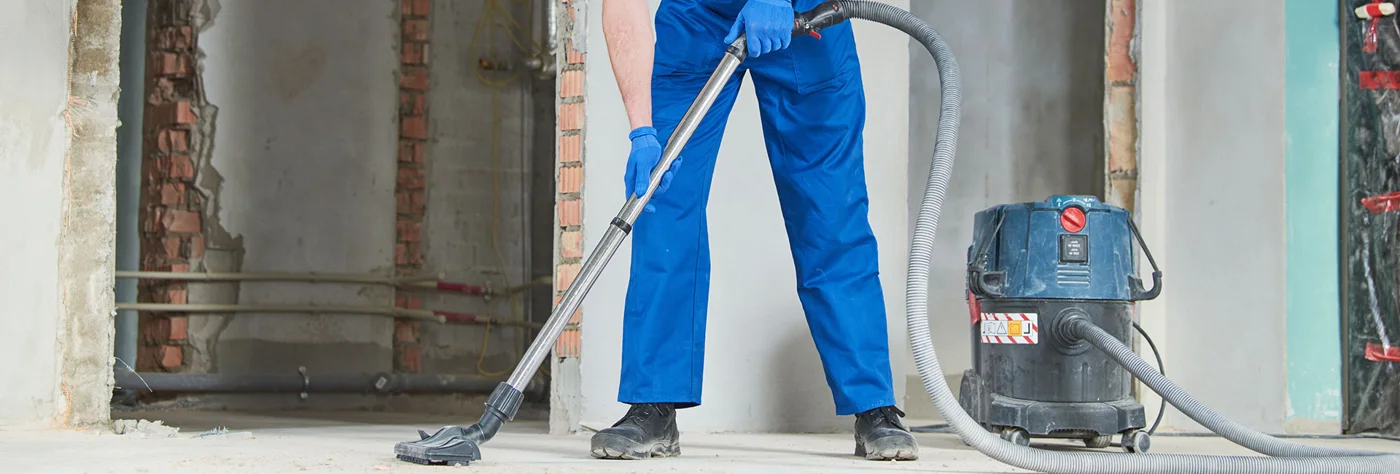 Vacuuming a floor after building work