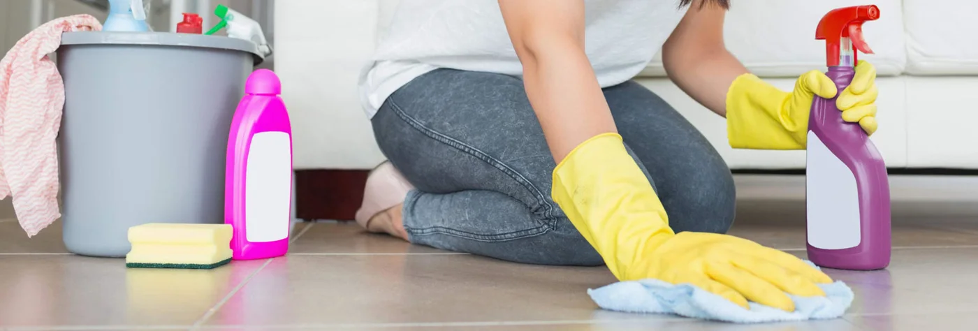 Cleaner wiping a floor surface