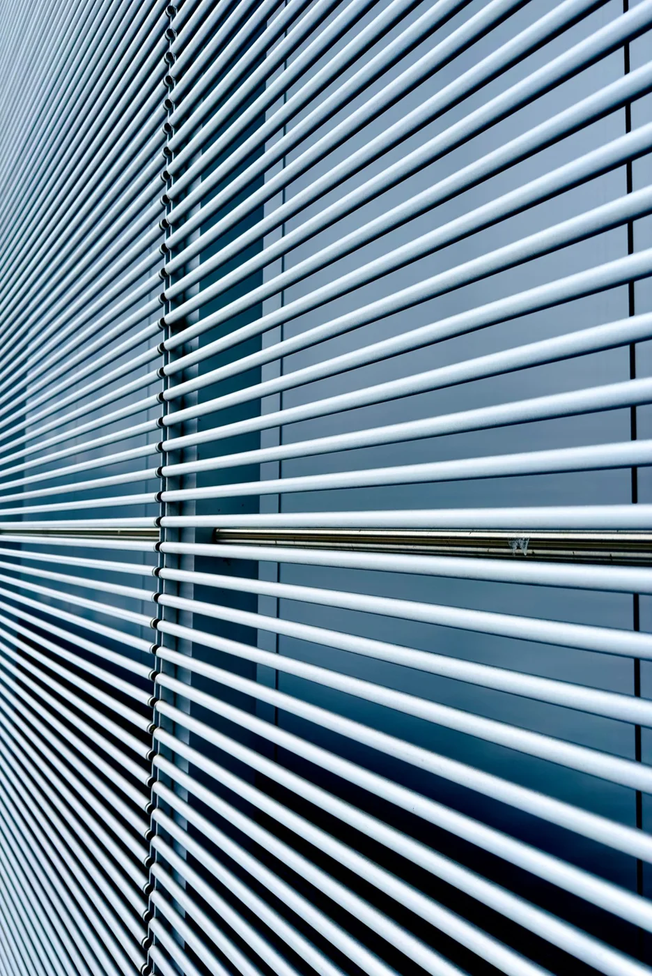 Horizontal slats on a window blind