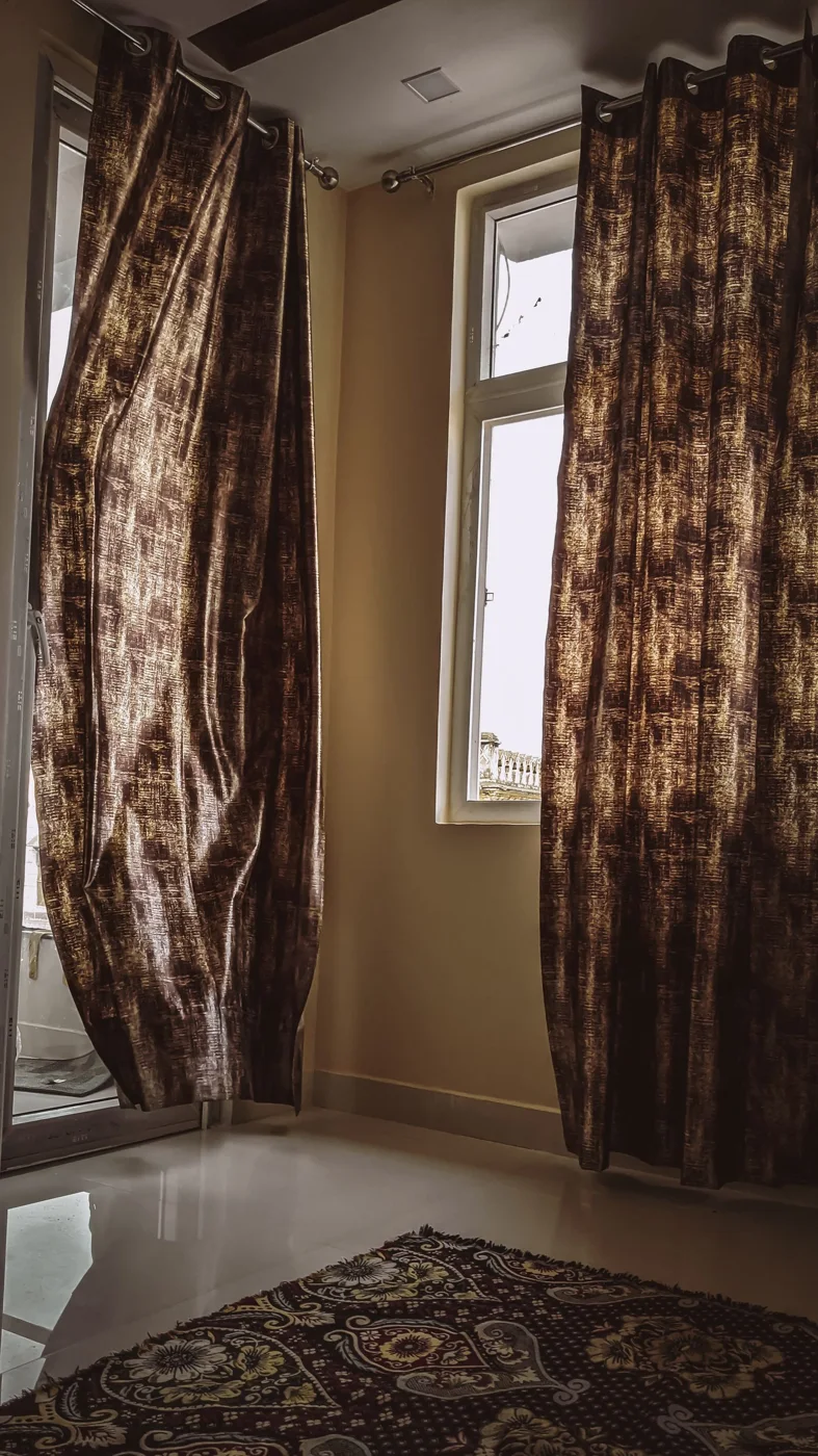 Draped curtains framing a window